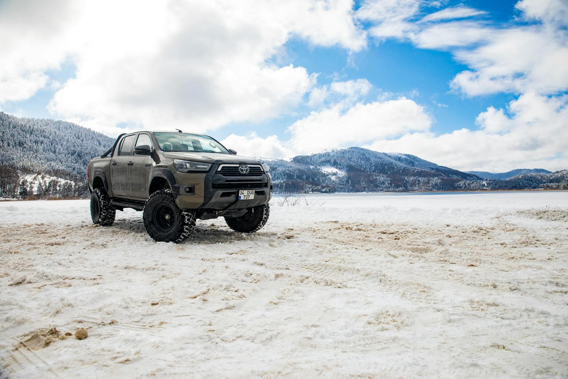 Lifted Toyota Hilux on dirt track